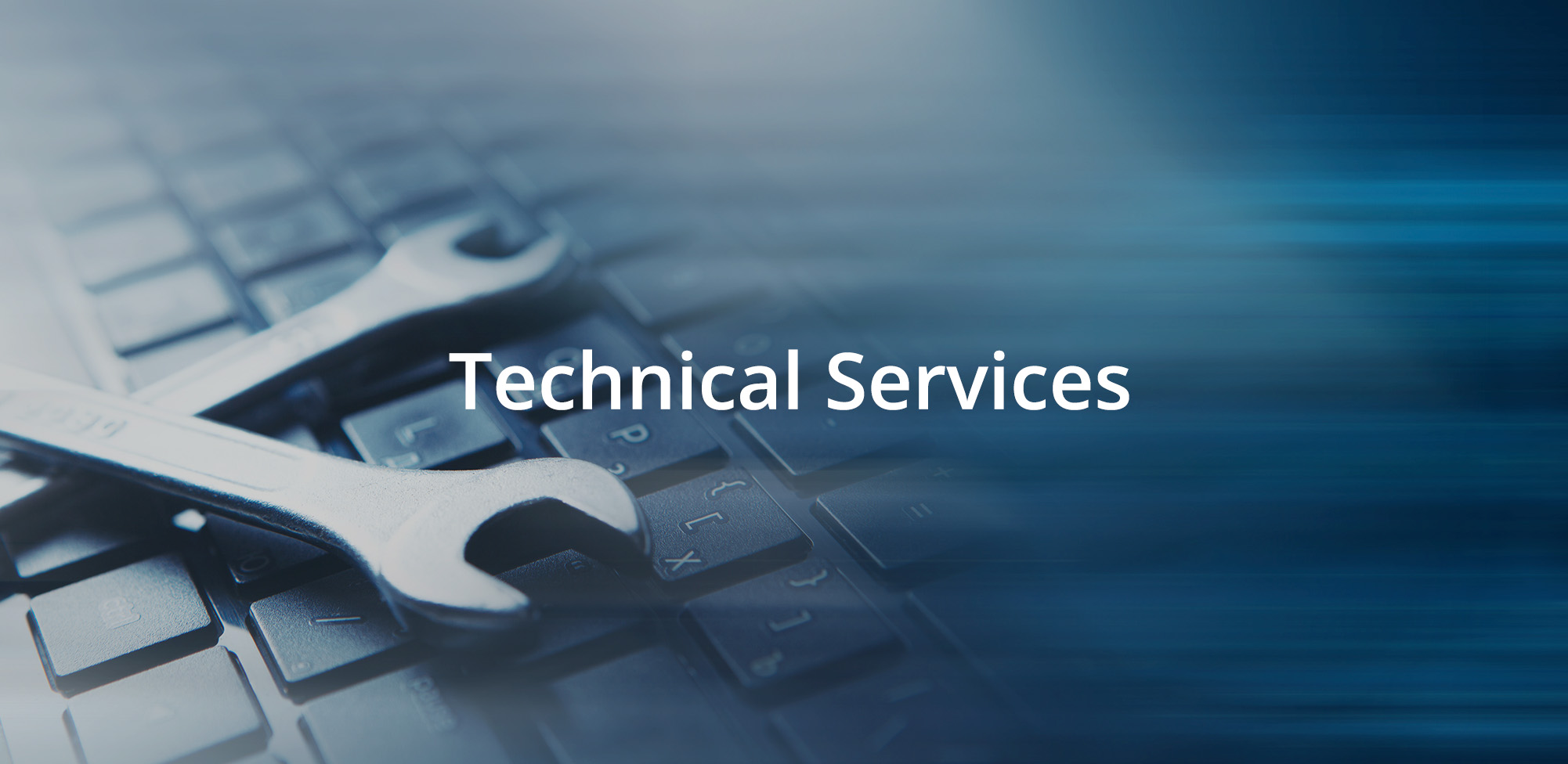 wrenches laying crossed over a laptop keyboard with the text 'Technical Services' on top